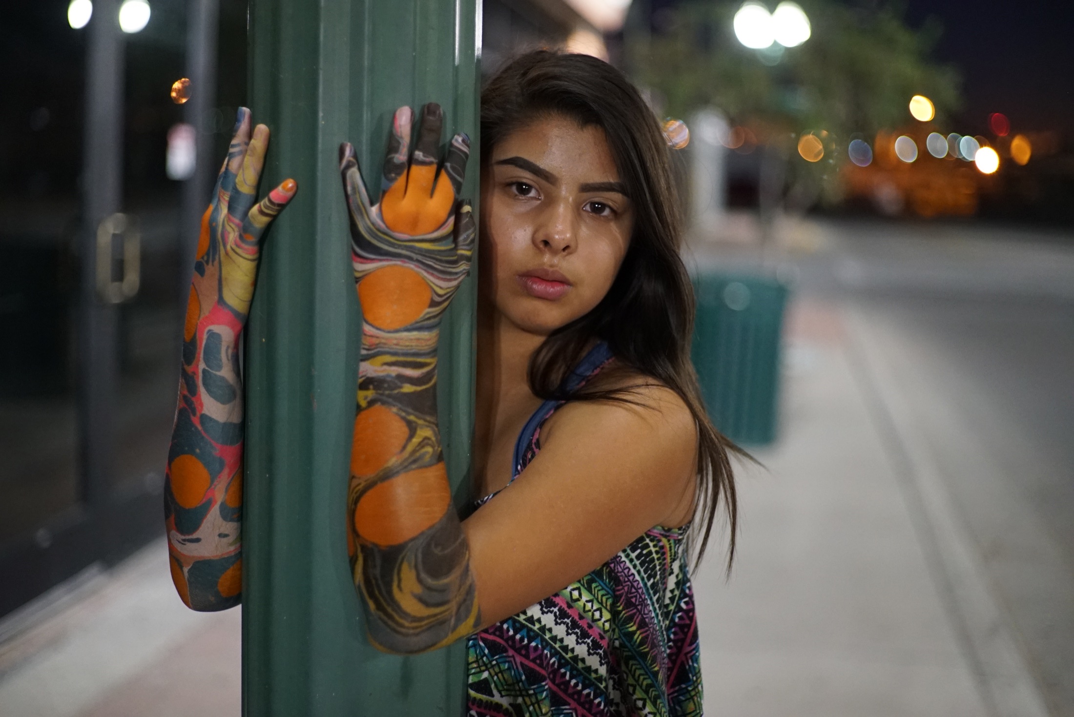 Portrait with Ebru marbling applied to arms